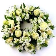 Pure white funeral wreath