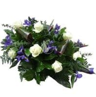 White,blue iris, roses  casket